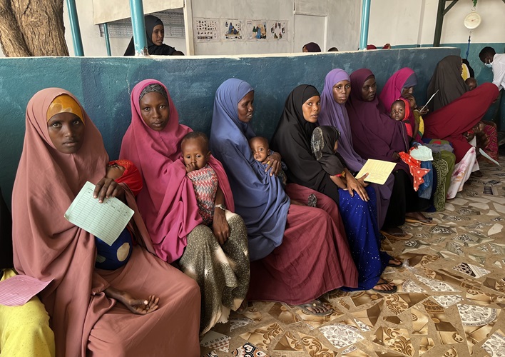 Women sitting in a line